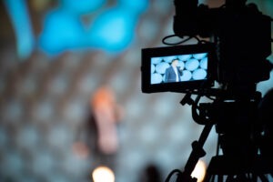 recording and streaming event presentation content for the virtual audience at a hybrid meeting